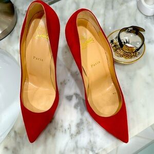 Christian Leboutin red suede heels. Perfect for the holiday season!